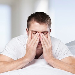 Frustrated man with hands in head