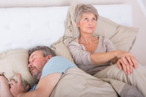 wife upset with husband for snoring
