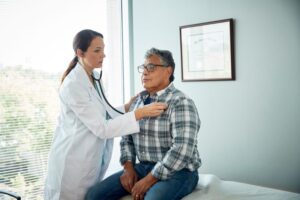 Man undergoing checkup in his doctor’s office